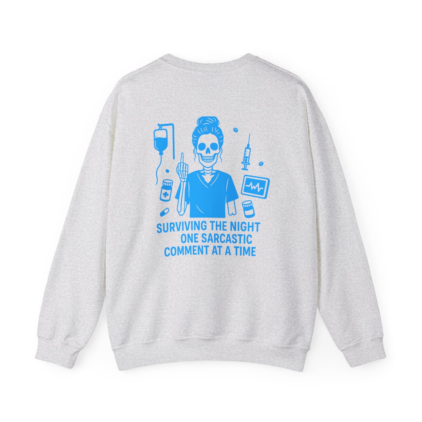 “Surviving the Night One Sarcastic Comment at a Time” – Unisex Nurse Sweatshirt