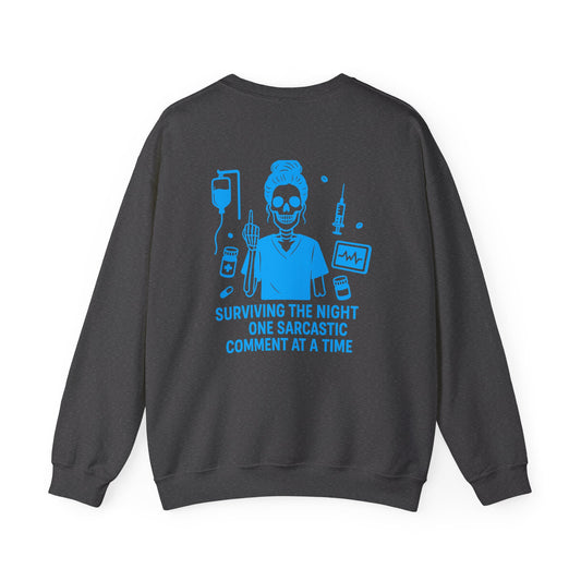 “Surviving the Night One Sarcastic Comment at a Time” – Unisex Nurse Sweatshirt